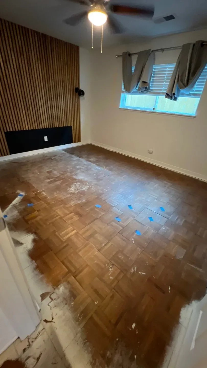 A room with damaged flooring
